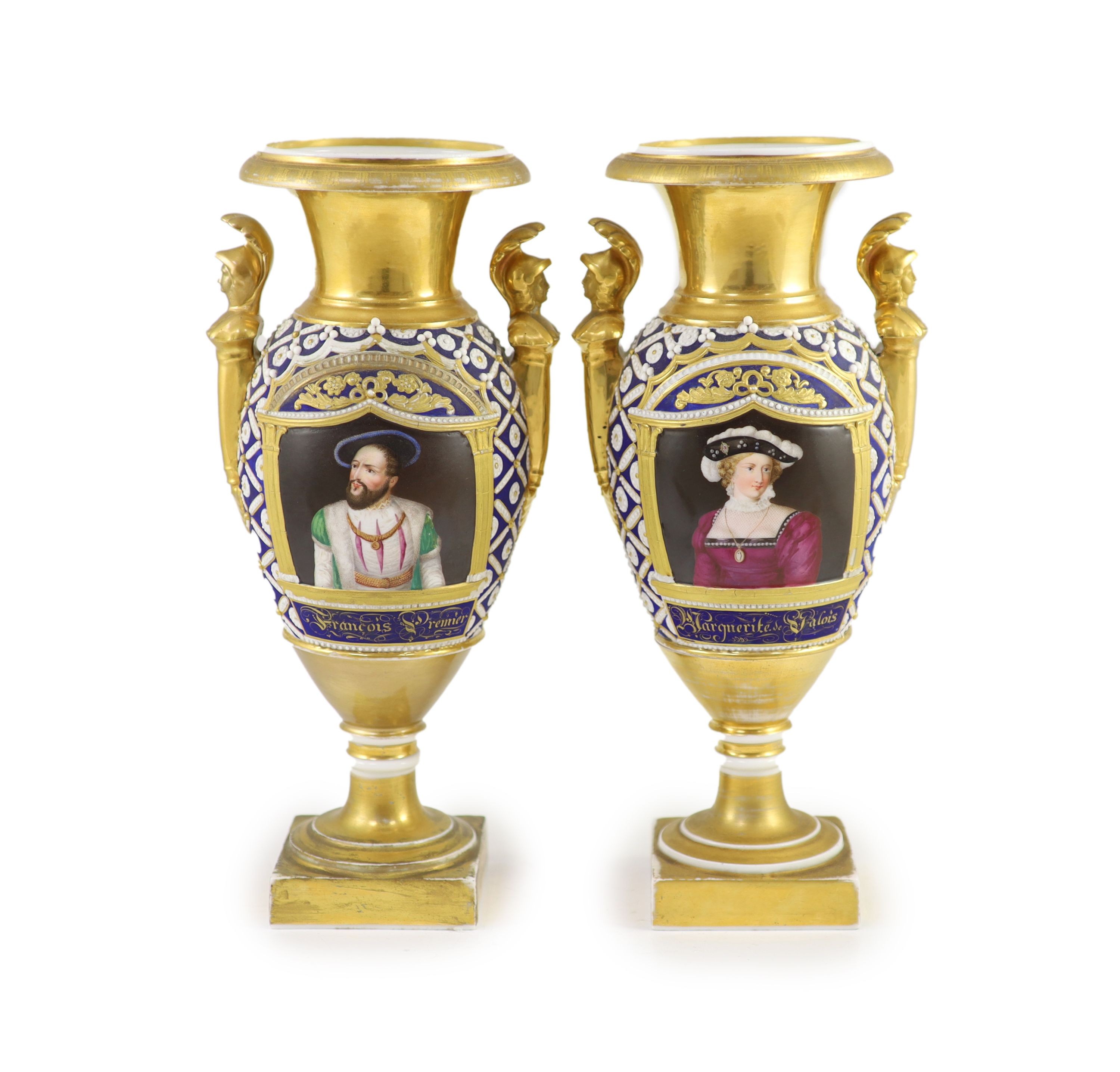 A pair of Paris porcelain vases, early 19th century, 33.5 cm high, one base restored